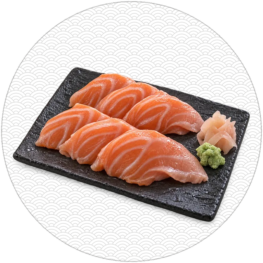 Salmon belly sashimi on slate, on a circle of Japanese wave pattern